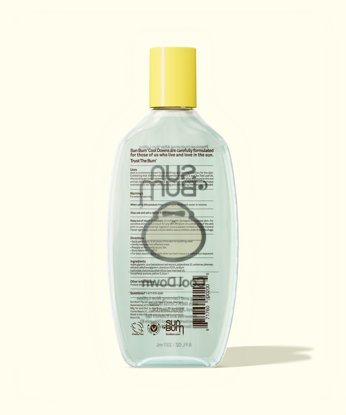Bottle of shampoo with a yellow cap on a white background