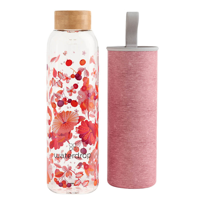600ml waterdrop Edition Glass Bottle made from durable borosilicate glass. The bottle features a design of red plants and a bamboo cap. It comes with a protective and insulating pink cover.