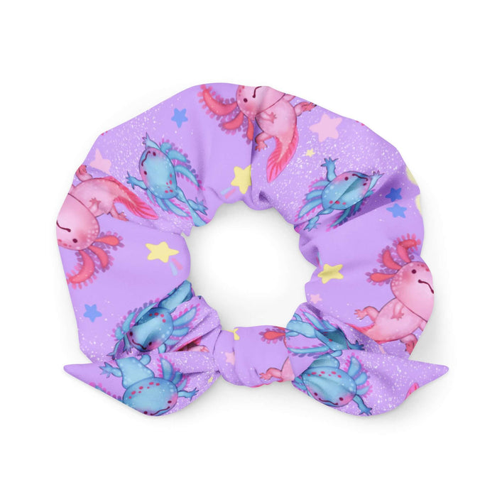 Axolotl kawaii scrunchie in lavender with pink axolotls and stardust speckles