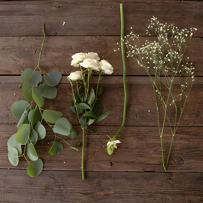 White flower greenery flatlay