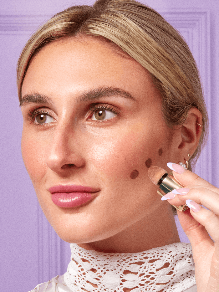 amalfi -- brewtiful trio model applying cheeky rose liquid contour sculpt on cheeks