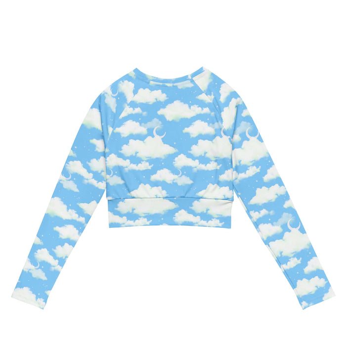 Cloudy Sky kawaii long-sleeve crop top with fluffy clouds and a crescent moon on a pastel sky
