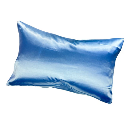 Blue satin pillow on a white background