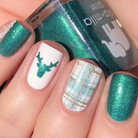 Emerald Memories green nail polish with reindeer and plaid accent nail art