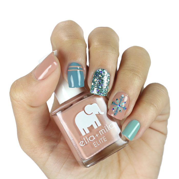 Global Goddess nude nail polish with teal glitter and mermaid accent nail art