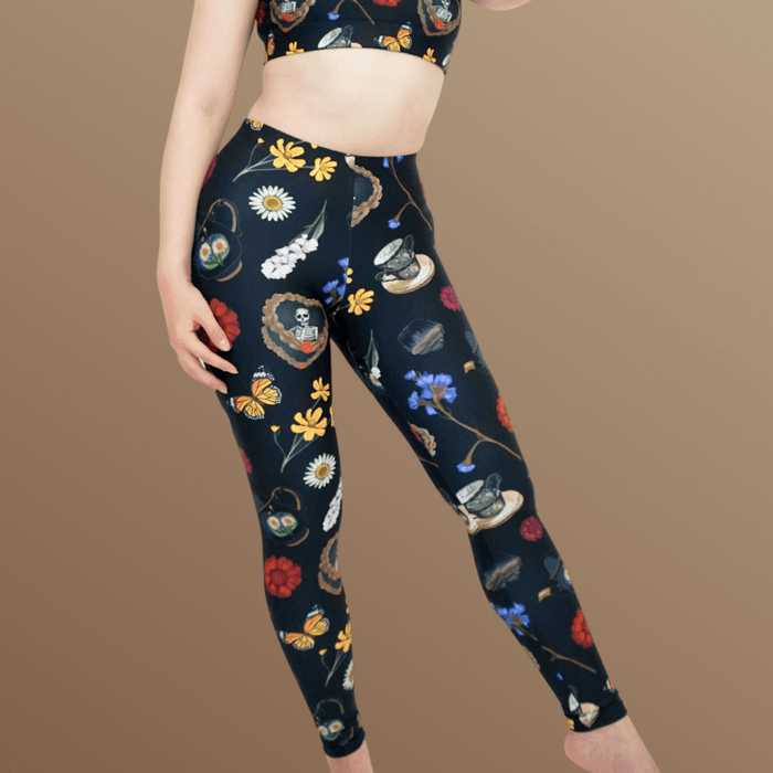 Gothic Tea Time leggings in black with pink snapdragons and golden cosmos, kawaii goth style