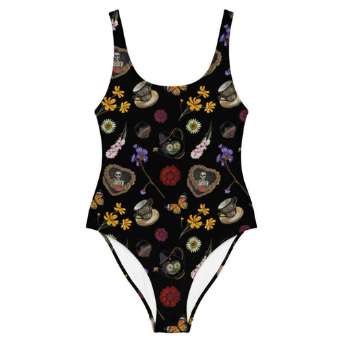 Gothic Tea Time one-piece swimsuit in black with gilded teacups and purple irises, kawaii goth style