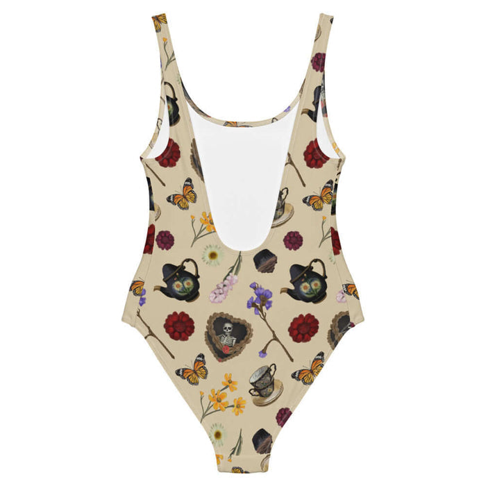 Gothic Tea Time one-piece swimsuit in black with a heart-wreathed skeleton and black teapots, goth fashion