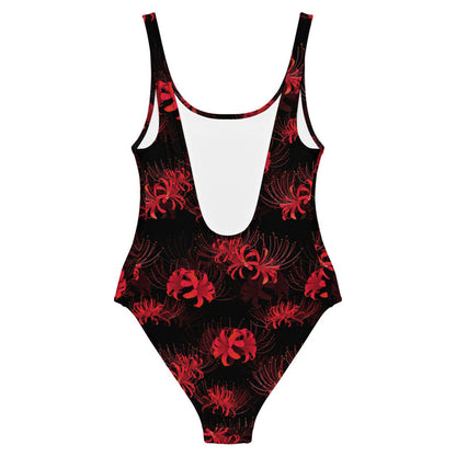 Higanbana gothic one-piece swimsuit in black with red, blue and teal spider lily blooms