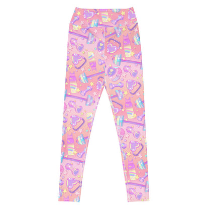 Glitter Gains kawaii high-waisted leggings with heart-shaped kettlebells and golden stars