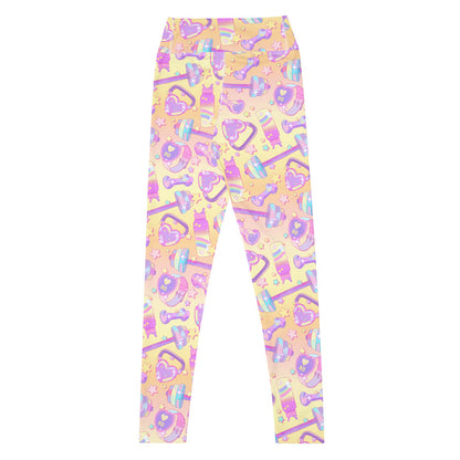 Glitter Gains kawaii high-waisted leggings with golden stars and holographic barbells, back view