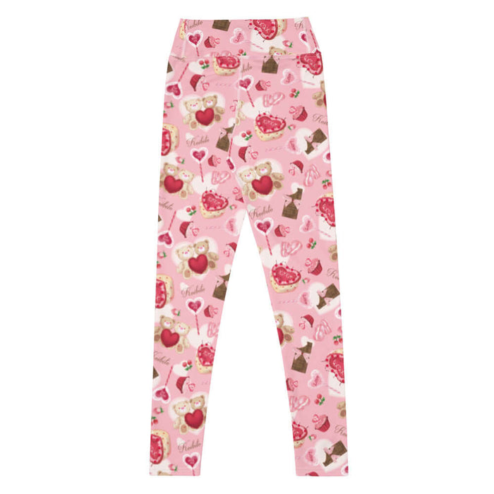 Sugar Sweetheart kawaii high-waisted leggings in pastel pink with ribbon-tied chocolate bars and strawberries