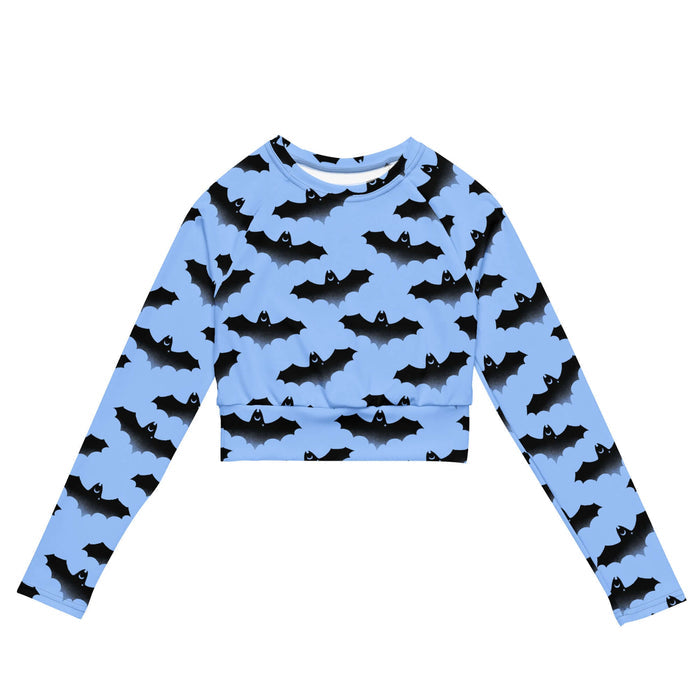 Lilith pastel-goth long-sleeve crop top in blue with watercolor bats and drifting clouds