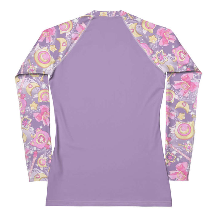 Magical Girl kawaii rash guard covered in magic scepters and heart gems, in purple