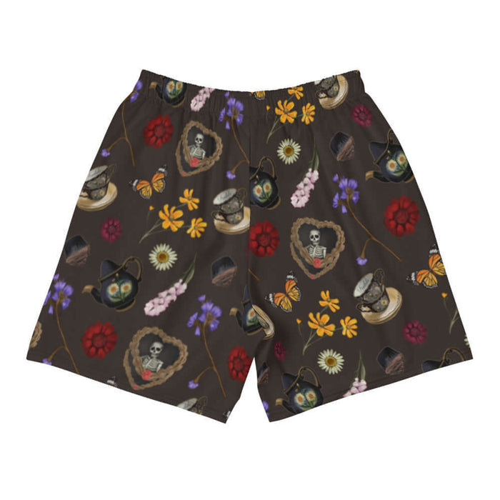Gothic Tea Time men's athletic shorts in black with a heart-wreathed skeleton and golden cosmos, goth fashion
