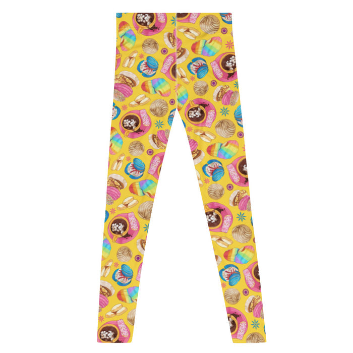 Pan Dulce kawaii men's leggings in yellow with rainbow-striped conchas and blue drizzled conchas
