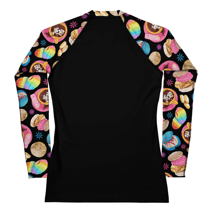 Pan Dulce kawaii rash guard in yellow with pink cortadillos and rainbow-striped conchas