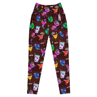 Monster Party alternative premium pocket leggings, crossover waistband view, with skeleton hands and glossy candy apples