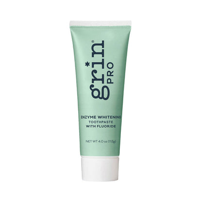 Front of 113g tube of Grin Pro Enzyme Whitening Toothpaste with Fluoride, a natural formula that removes stains, plaque, and freshens breath.