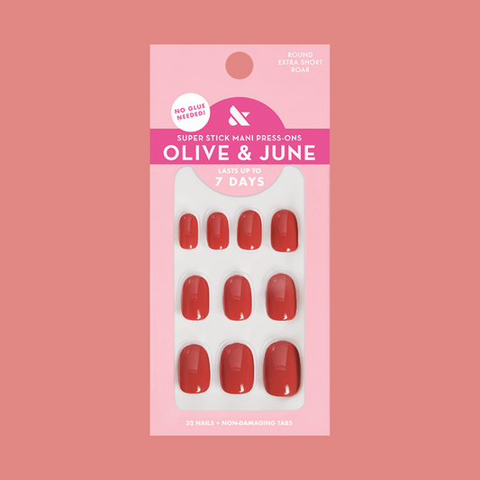Roar - Tab Press-On | Extra Short | Round in bold pinky red press-on nails with no glue needed for an easy at-home mani