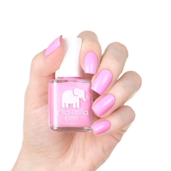 Serendipity pastel purple pink nail polish manicure on a light skin tone with the bottle