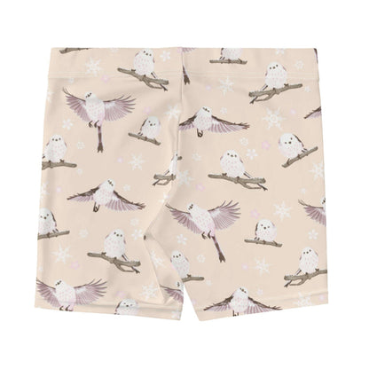 Snow Bird kawaii shorts in soft pastels with mid-flight birds and falling snow