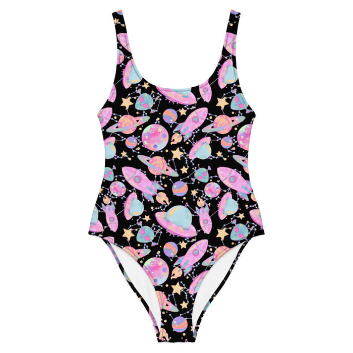 Space kawaii one-piece swimsuit in lavender with rainbow-swirled planets and glowing orbs