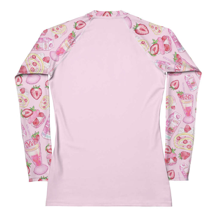 Pink kawaii Strawberry rash guard with sliced strawberries and milkshakes