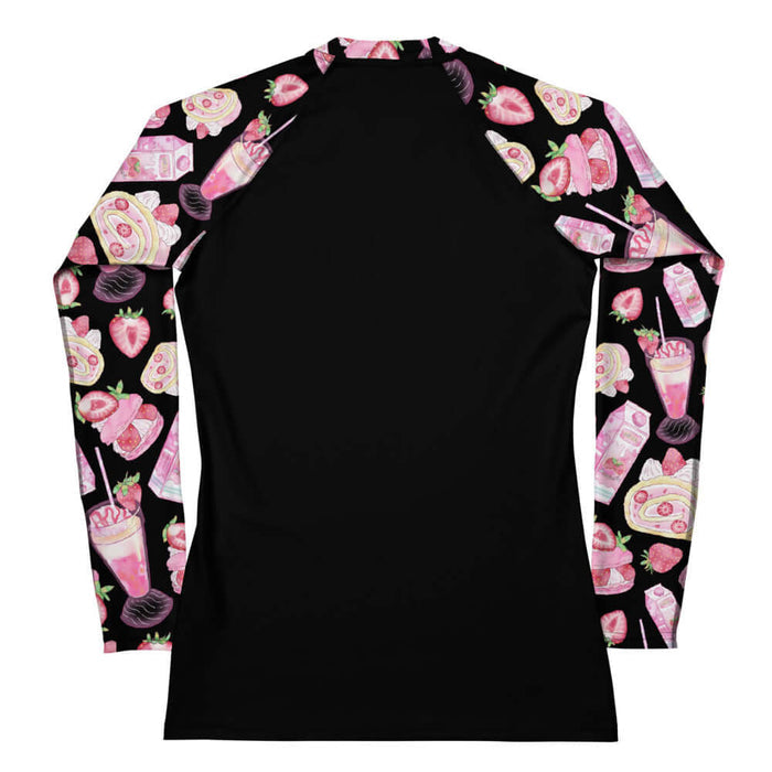 Back view of Black kawaii strawberry rash guard with pink macarons and milkshakes
