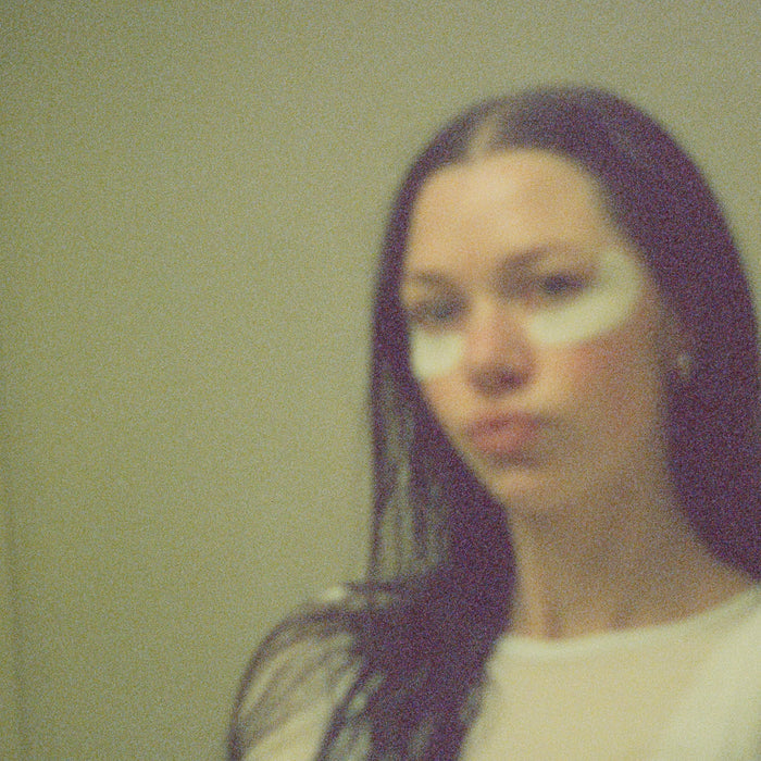 Person wearing Colorescience Total Eye Hydrogel Undereye Patches