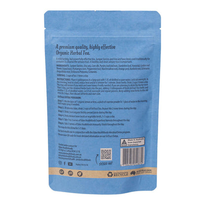 Back view of Eden Healthfoods UriTract Tea 60g packet, showing the product description, ingredients list, serving suggestions, and instructions for use. The packet includes details on its herbal blend—juniper berries, corn silk, bearberry, and horsetail—designed to support urinary health and assist in removing infections and stones from the kidneys and bladder.