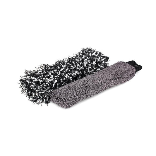 Two different Detail Factory Wheel Brush socks on a white background. One with long fibers and the other with short.