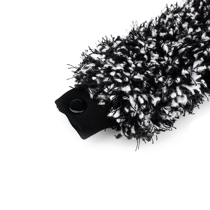 The cuff of a Detail Factory Brush on a white background.
